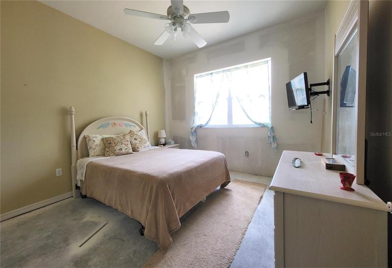 The third bedroom needs flooring, maybe the same as all other rooms for continuity?