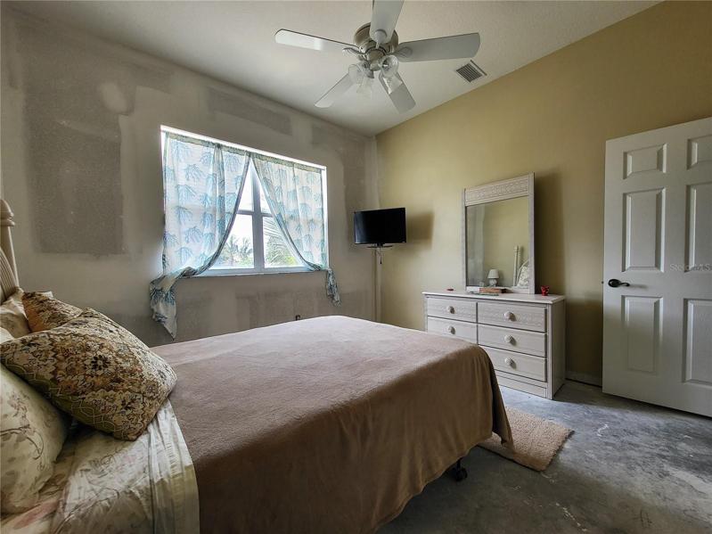 Located in the back corner of the house, this room has a view of the canal
