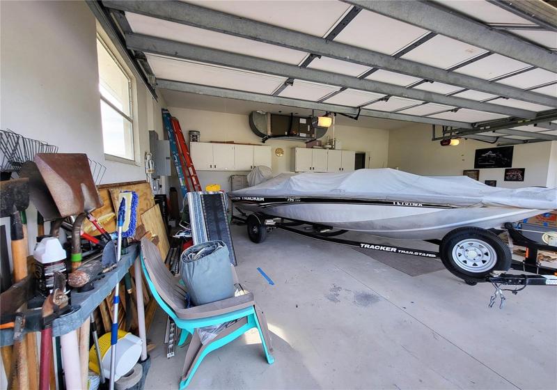 Looking in from the driveway. Note the cabinets on the back wall