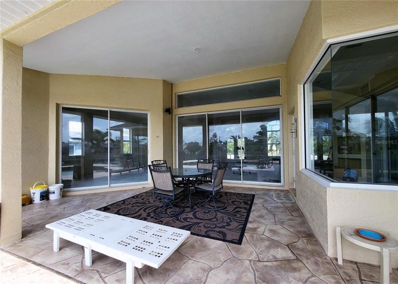 Lanai, under roof, with attractive finish on the floor.