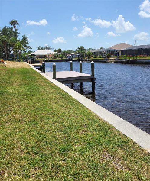 Concrete seawall and composite dock