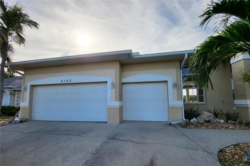 3-car garage with wide driveway
