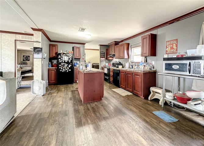 Kitchen to Living Rm, Bedroom, Laundry Rm