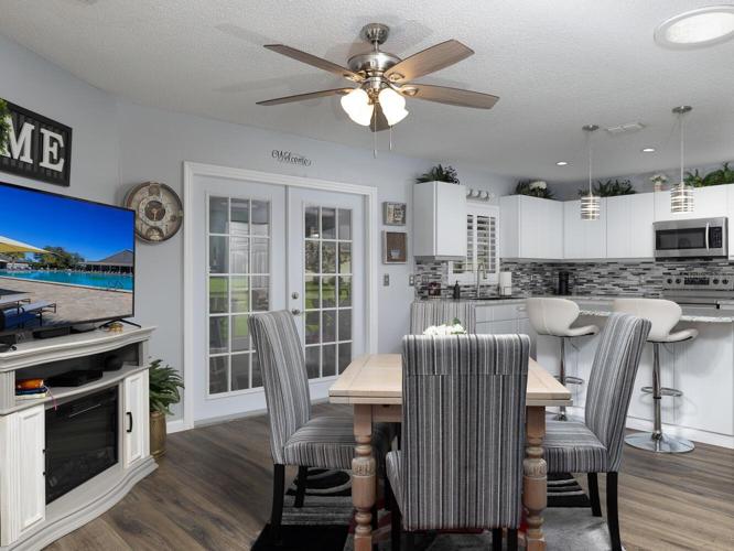 Eat-in area in kitchen looking out french doors to back porch