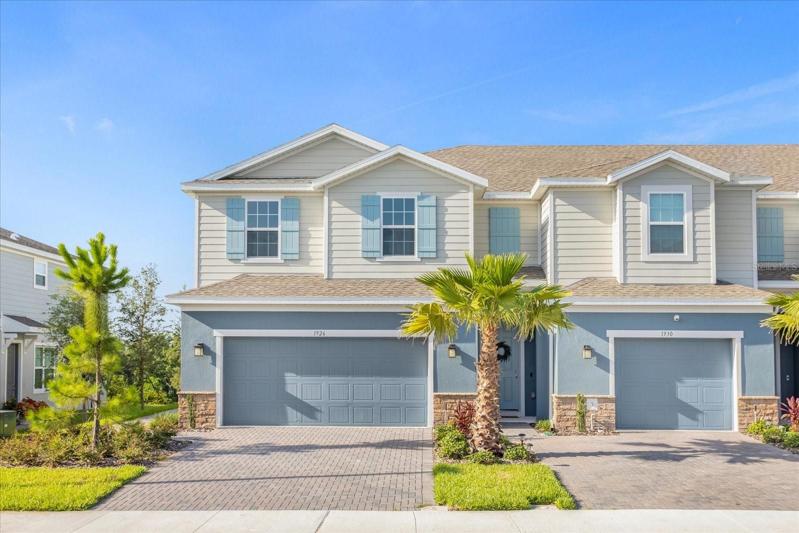 Corner unit with a 2 car garage.