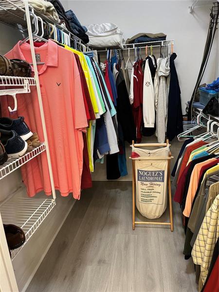 MASTER BEDROOM WALK IN CLOSET