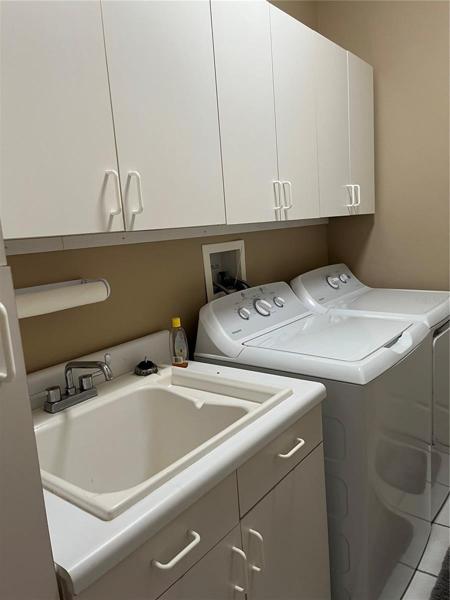 LAUNDRY ROOM WITH UTILITY SINK