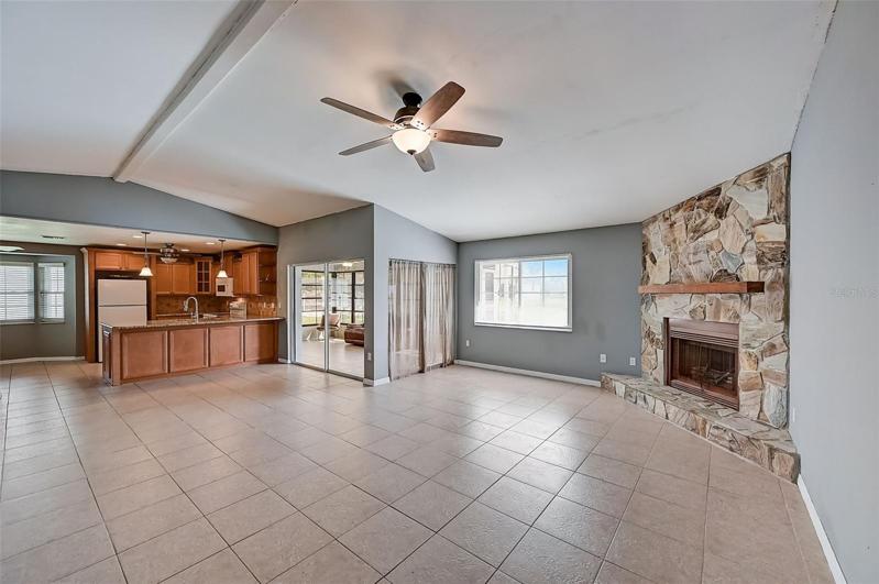 7202 Peacock Lane LR with fireplace as you enter the home