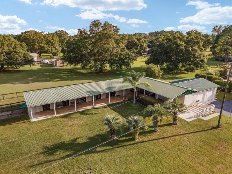 6 stall Barn with workshop, tack room, wash rack, 2 stall garage