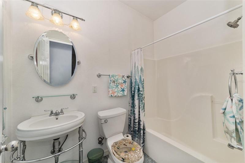 Full bath downstairs by the entrance to bonus room