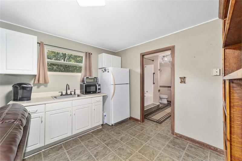 Full kitchen and bath in apartment