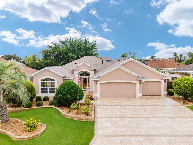 BOND PAID!!!  STUNNING "LANTANA" DESIGNER HOME WITH 3-CAR GARAGE IN THE VILLAGE OF AMELIA.