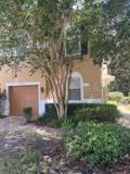 Front elevation from the street. Mature landscaping.