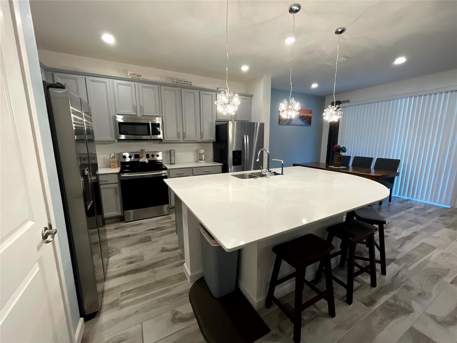 kitchen with dining behind