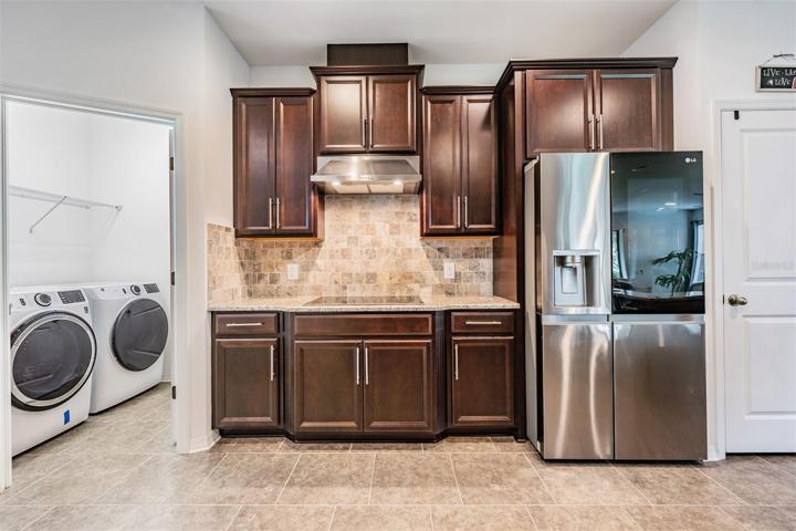 Refrigerator has door you knock on to see what is inside without opening fridge door!