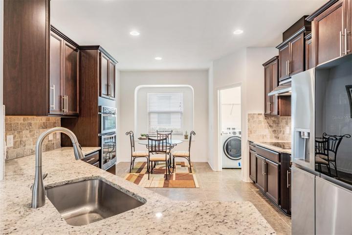 kitchen nook with bay window & space for table & chairs