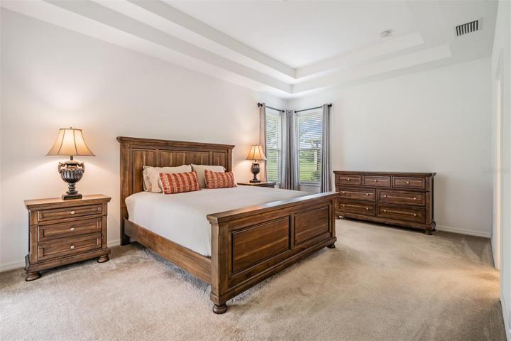 Owners bedroom w/double trayed ceiling