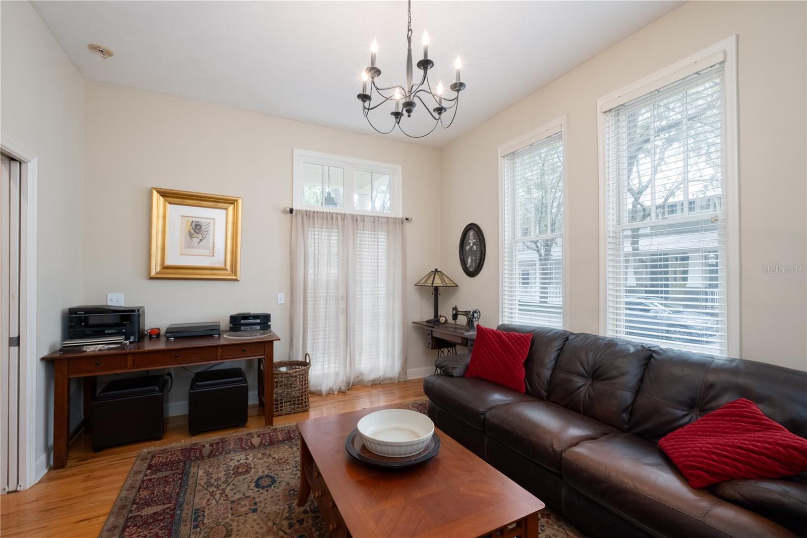 Downstairs Guest Room with French doors to front porch