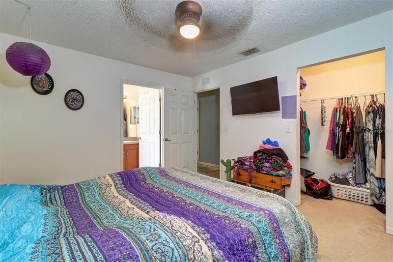 Master Bedroom with view to walk-in closet and en suite bath