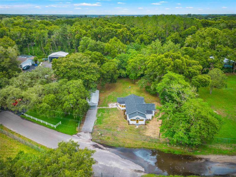 The spacious lot provides ample room to park your Boats, RVs, or Work Vehicles