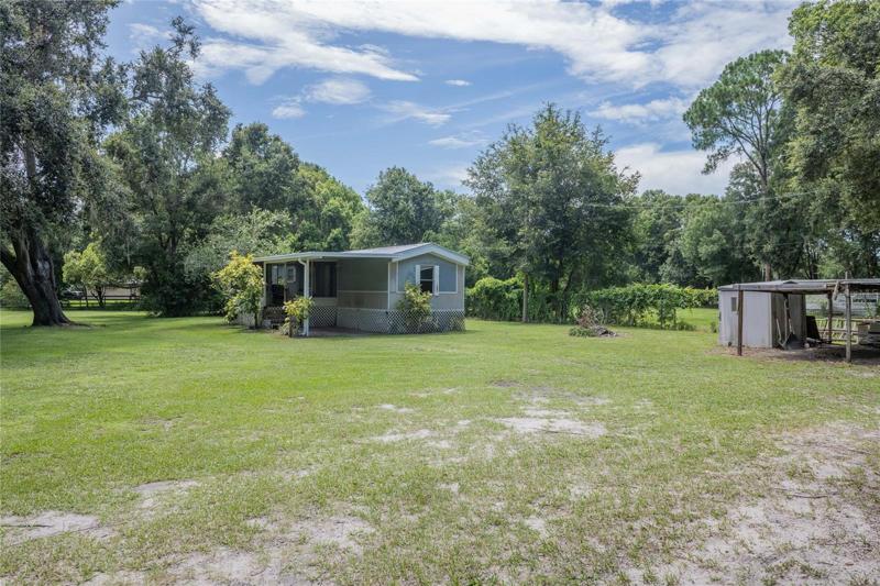 Mobile home-storage only.  Has own address and separate electric meter.