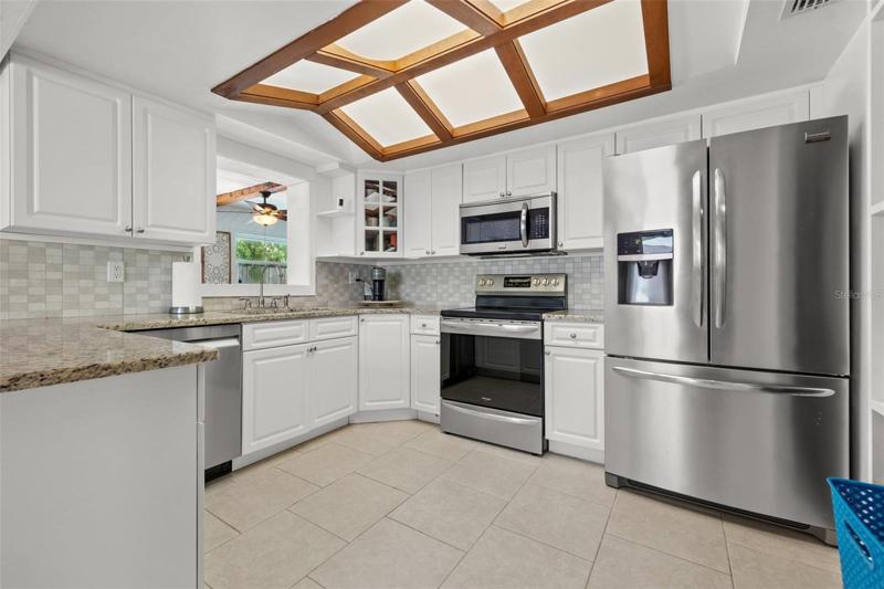 Updated kitchen with stainless appliances and new fixtures!