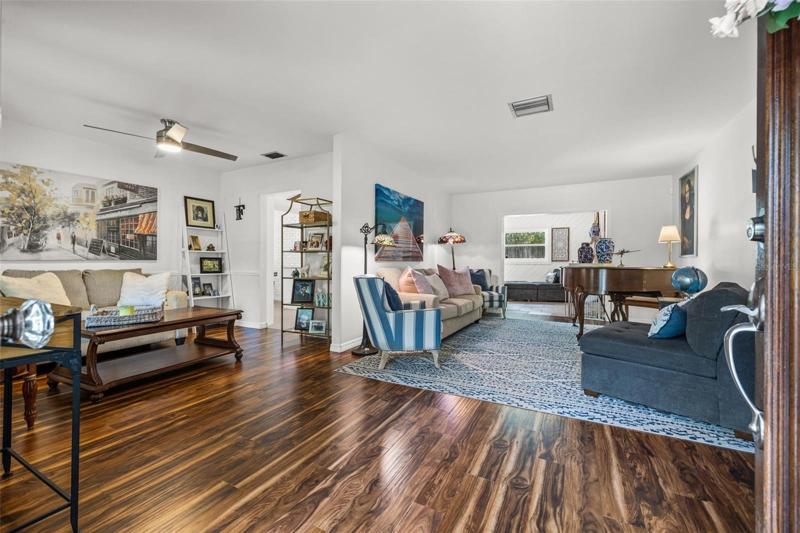 Living room/ Family room with beautiful engineered hardwood floors!