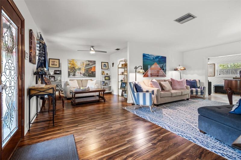 Living room/ Family room with beautiful engineered hardwood floors!