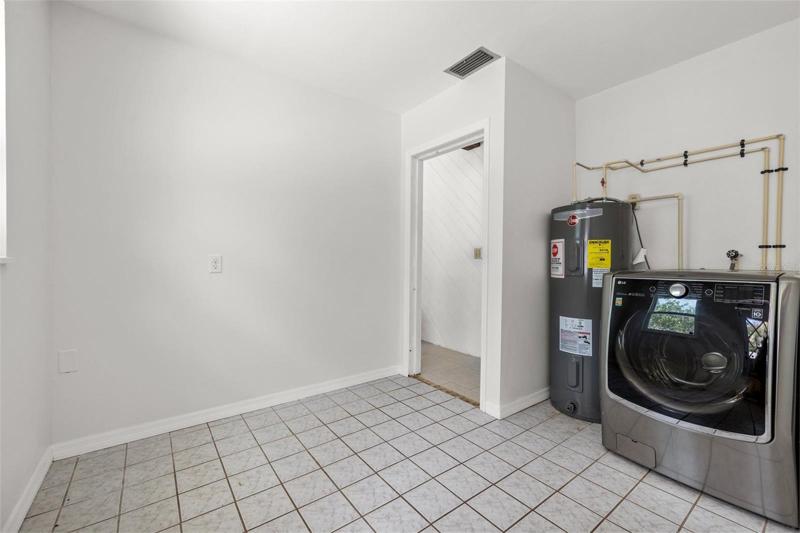 Laundry room- large enough for a den or other flex space.