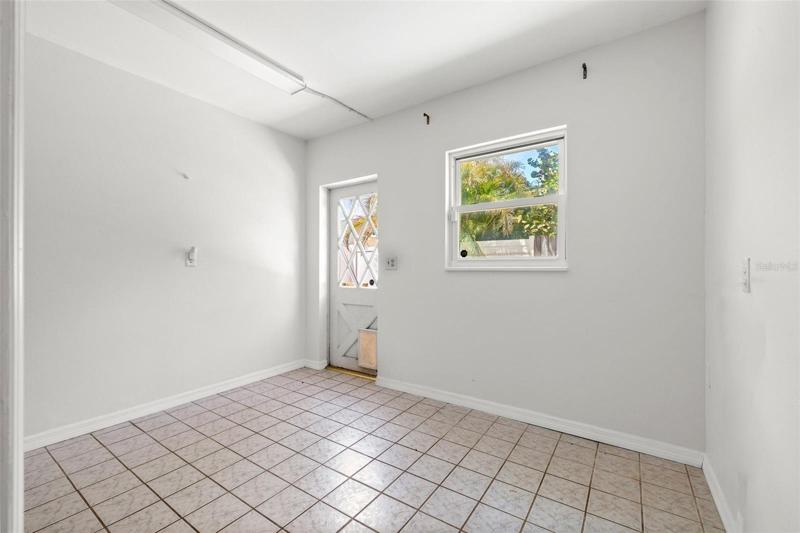 Laundry room- large enough for a den or other flex space.