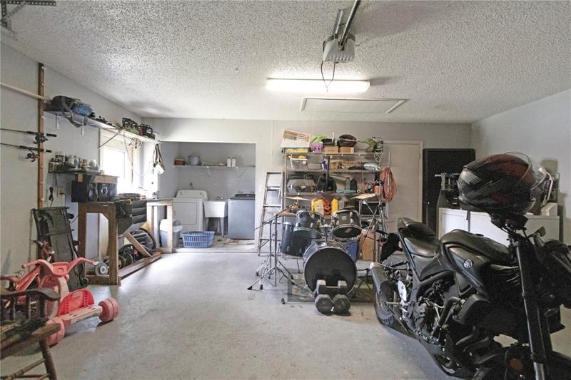 Garage W/Laundry Area & Storage Room