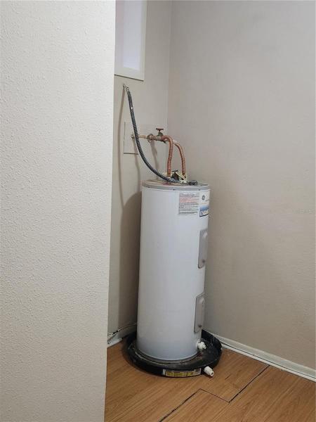 Hot water heater in storage room