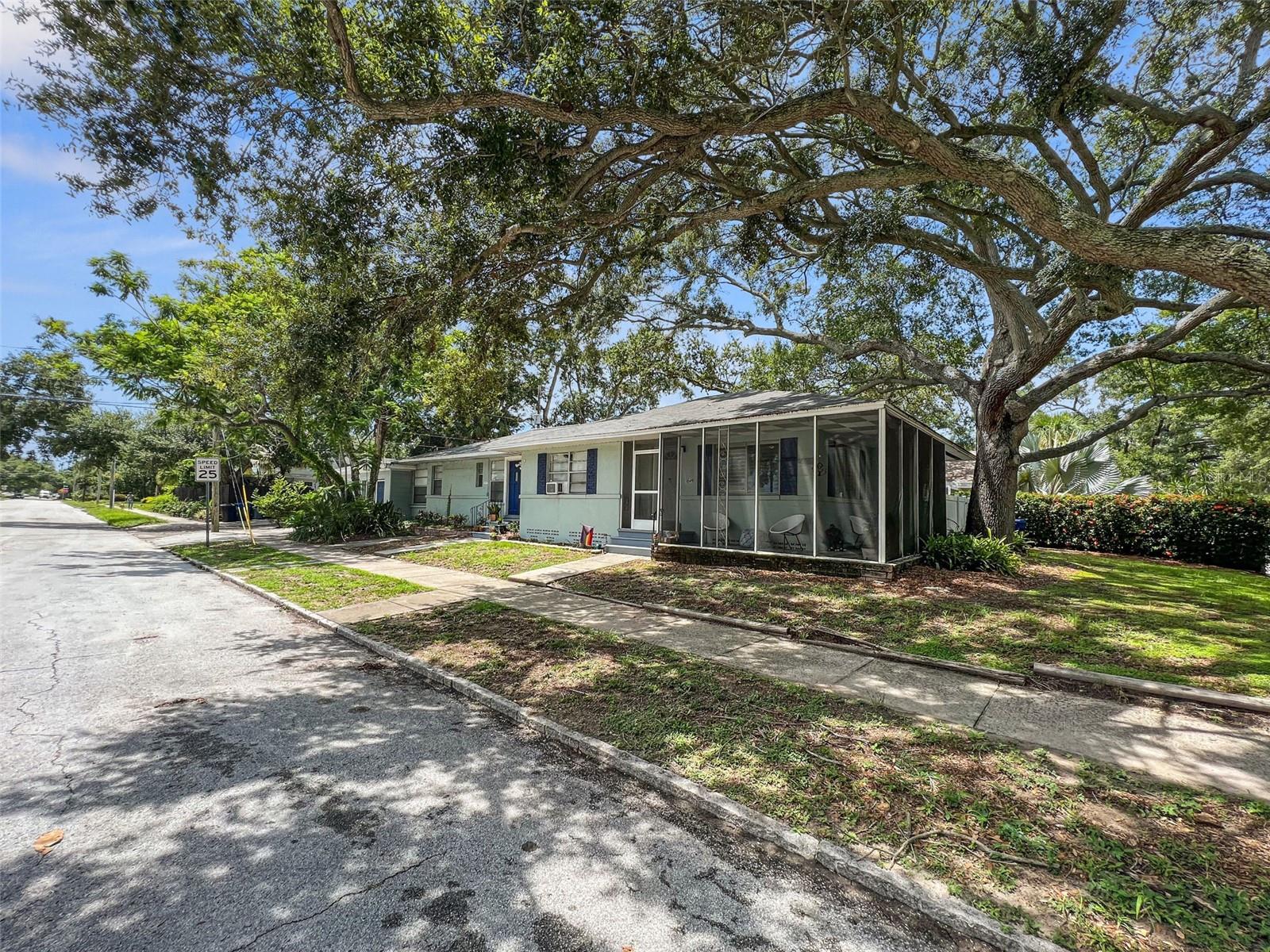 1045, 1047 and 1047 1/2 Triplex on pretty shaded corner lot nestled in a great neighborhood.