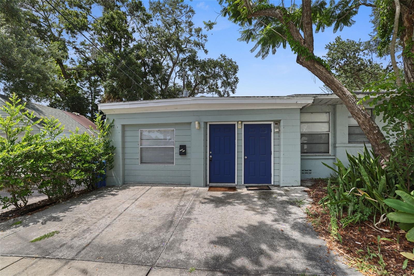 Entrance to 1047 1/2 with parking at your door, next to shared laundry
