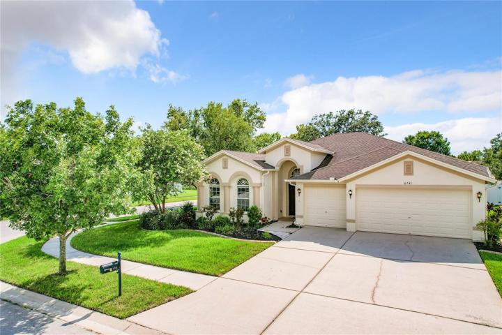 6748 Sparkling Way sits on a lovely corner lot.