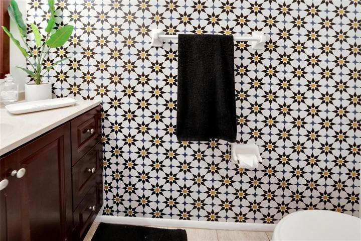 1/2 bath with pocket door.
