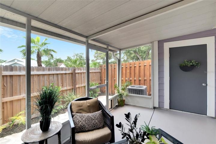 Storage closet attached to porch.