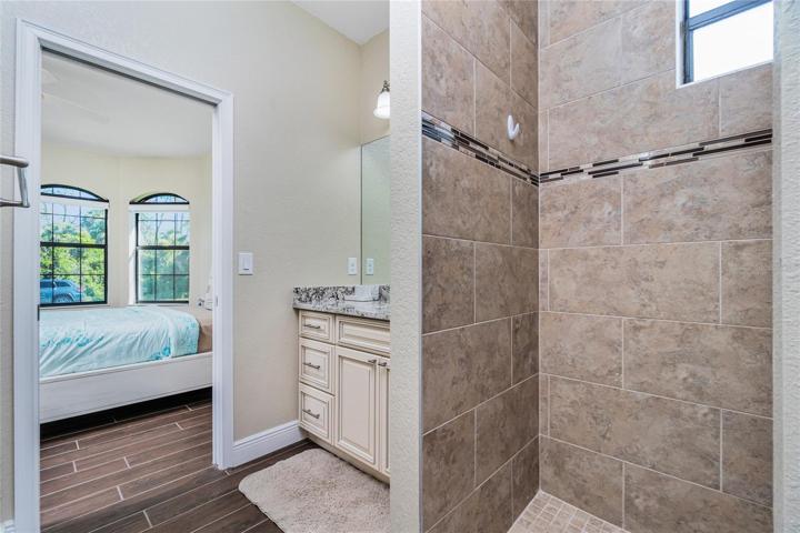 Tile shower guest bathroom