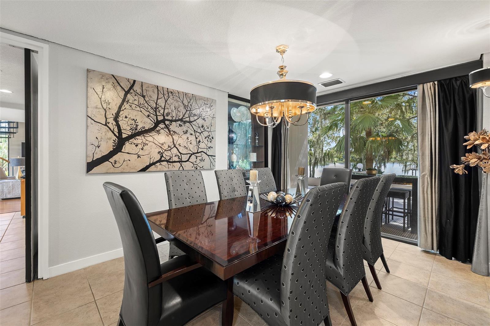 FORMAL DINING ROOM WITH LAKE VIEWS