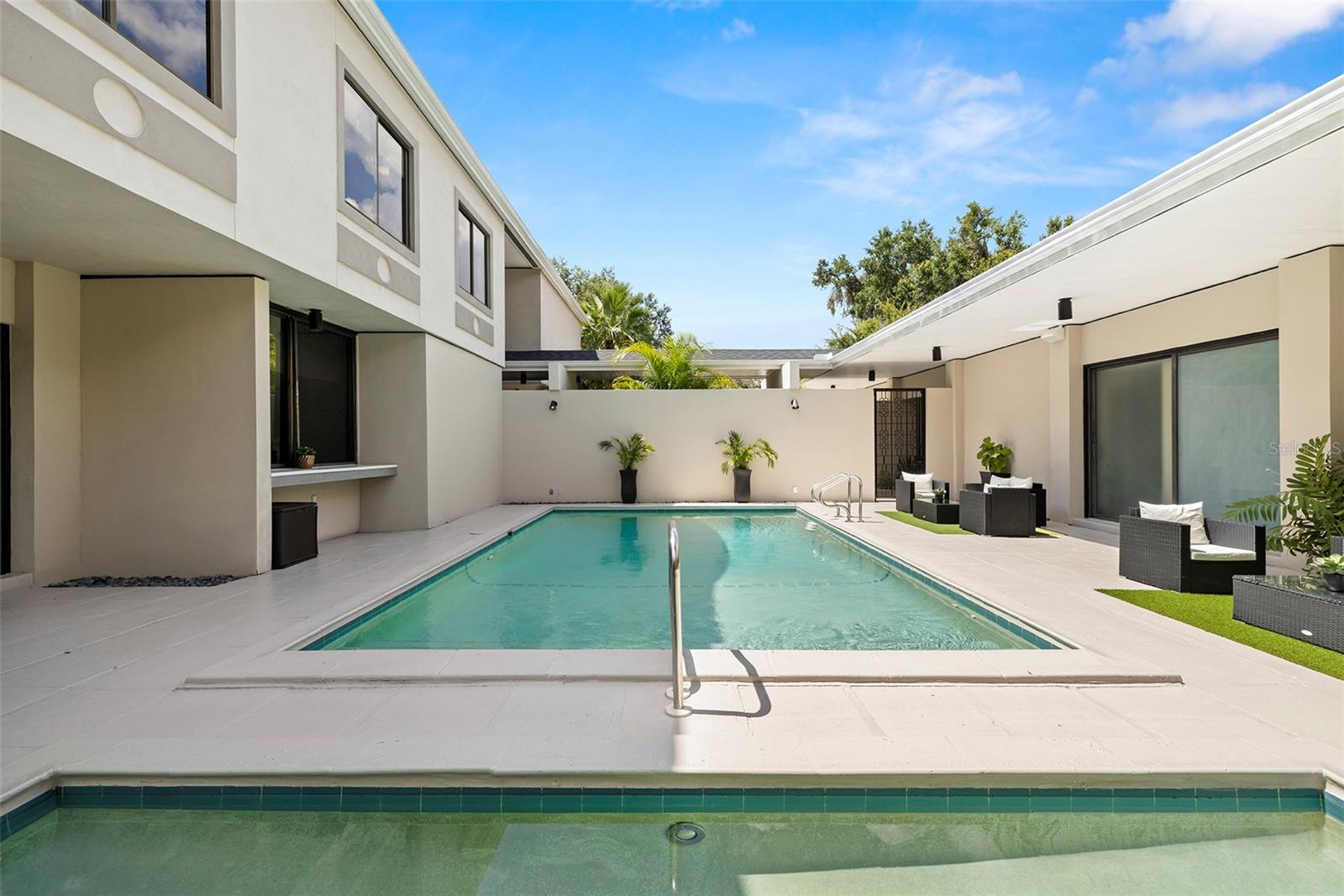 POOL COURTYARD WITH BAR AND A PASS THROUGH WINDOW