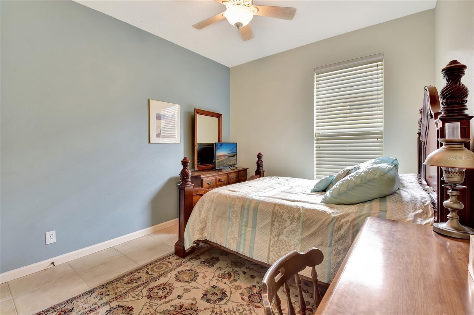Bedroom 2 with shows queen bed