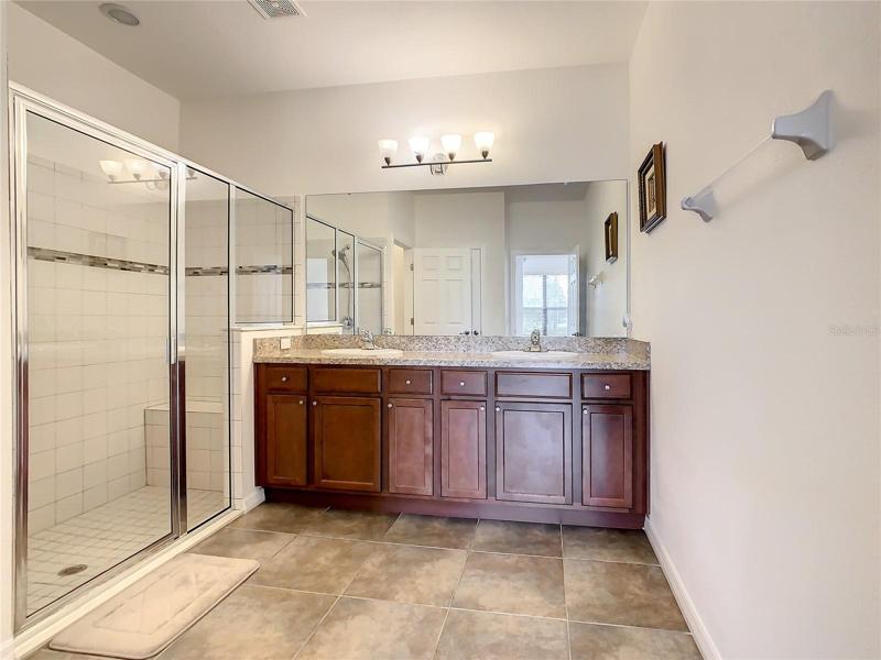 En-Suite Bath with Walk In Class Enclosed Shower
