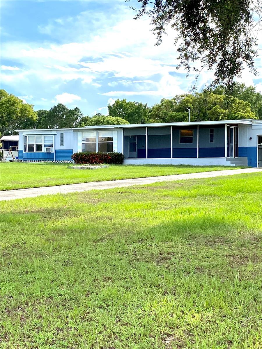 Front of Home with large front yard