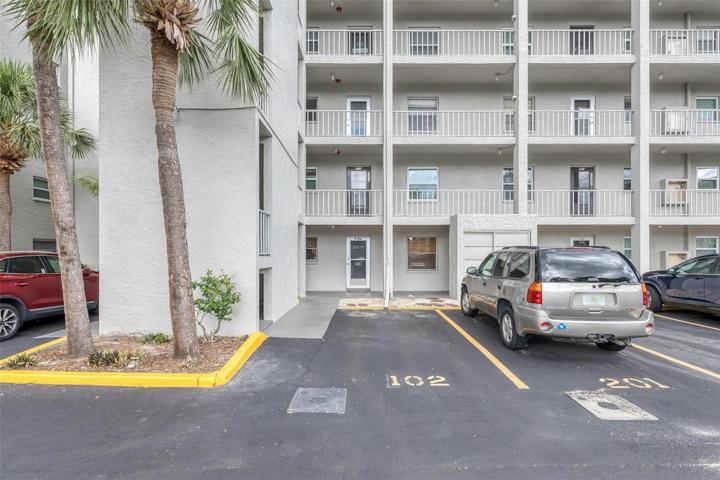 Entrance with parking space #102