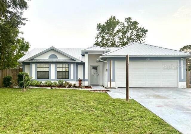 Beautiful 3 bedroom, 2 bath, 2 car garage on 1/2 acre lot!