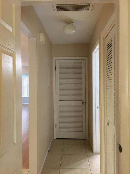 Hallway w/extra closet/storage room