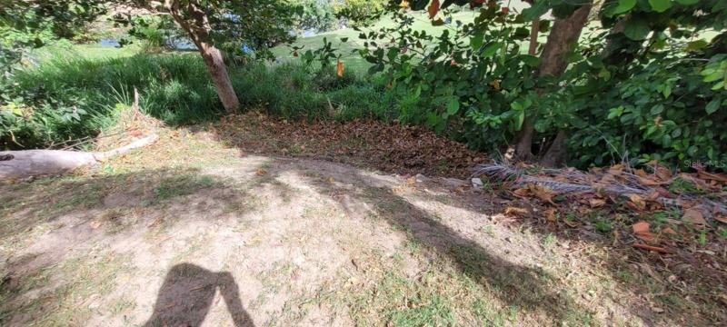 Easement behind the lot. It connects with Beach Village/Golf course