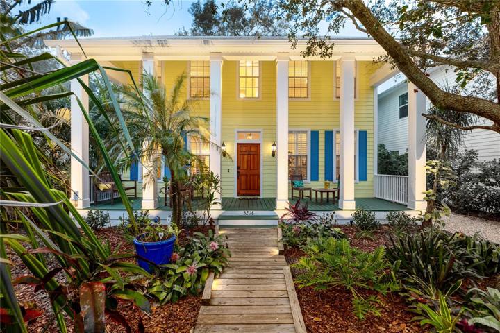 Low Voltage LED lighting illuminates the path to the front porch of this beautiful Key West Style home.