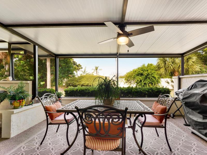 Roofed & newly screen patio off Great Room