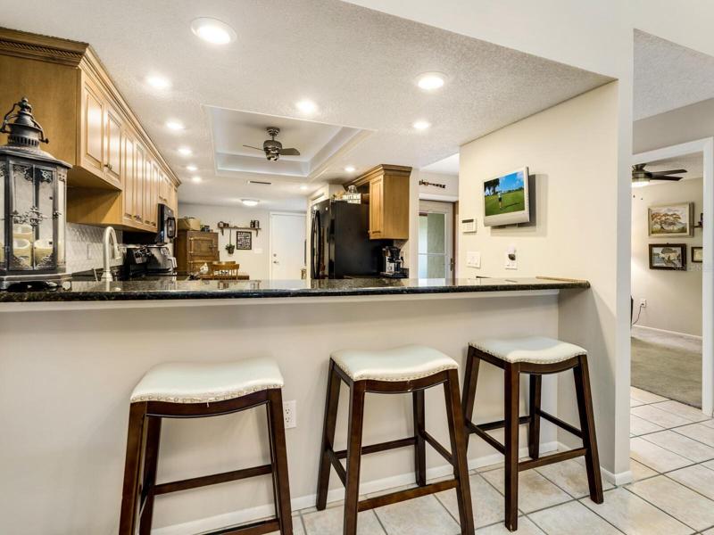 Big open kitchen with counter seating.